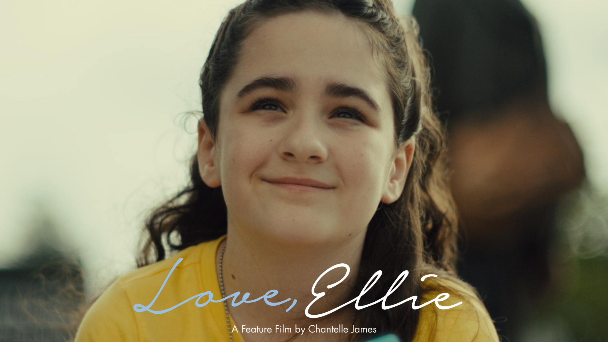 Ellie smiling with the Love, Ellie title card and the text A Feature Film by Chantelle James